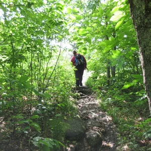 Danie stepping out onto the summit ledge