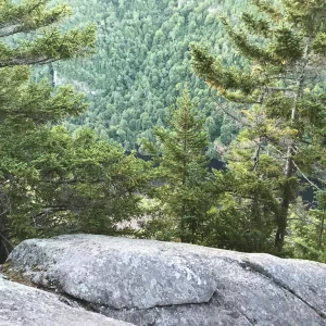 Cascade lake in foreground.