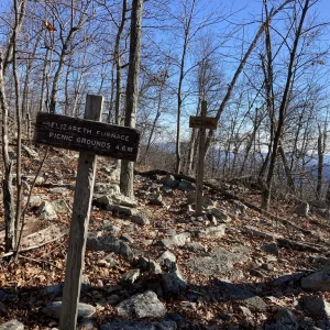Trail junction on ridge.